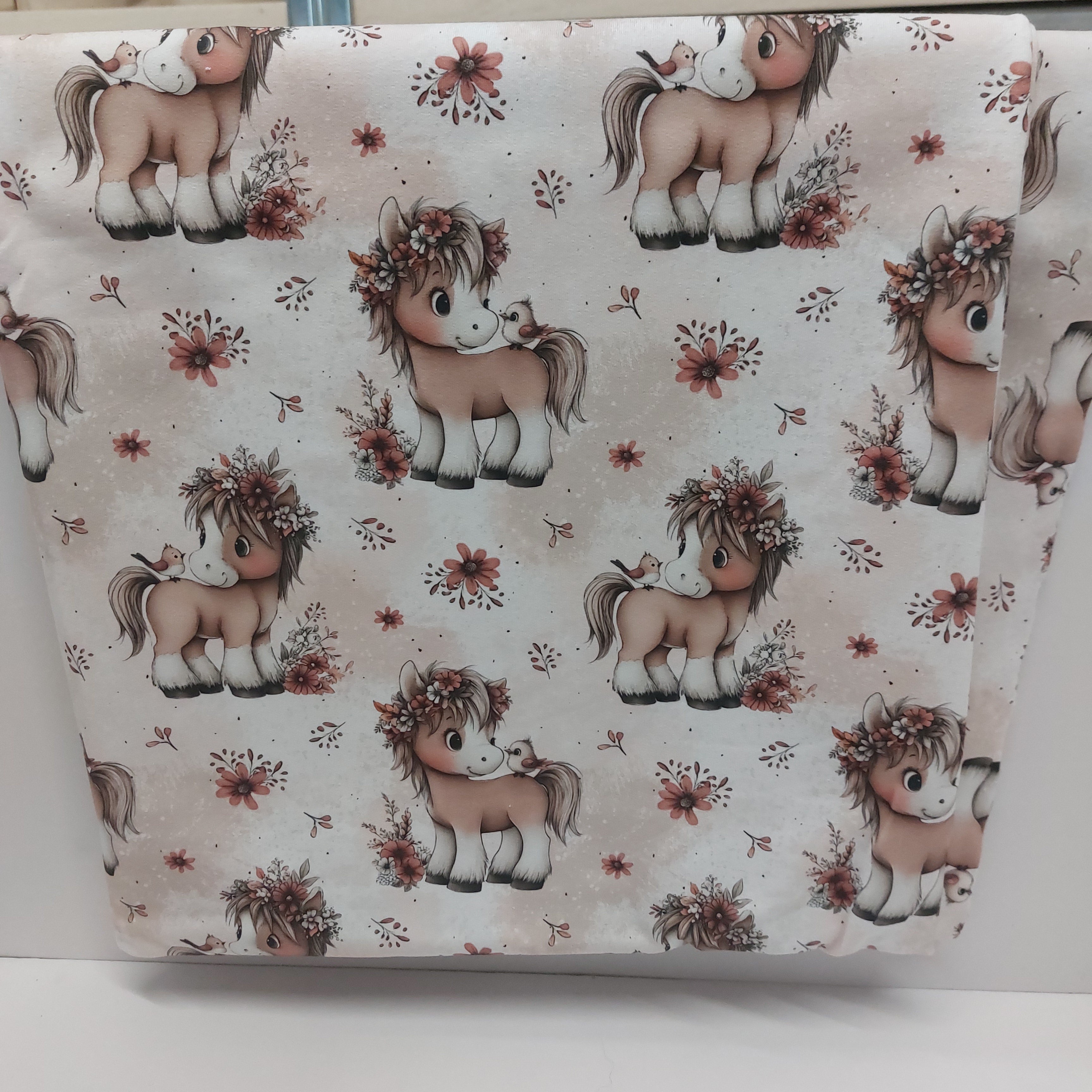 Pony mit Vögelchen